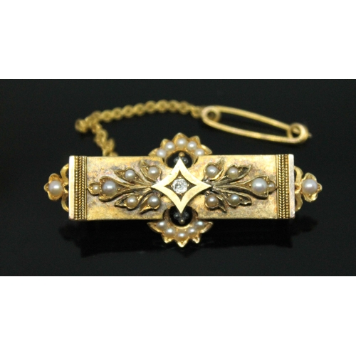 131 - A Victorian Estruscan revival diamond and split pearl brooch, length 47mm, gross wt. 7.2g.