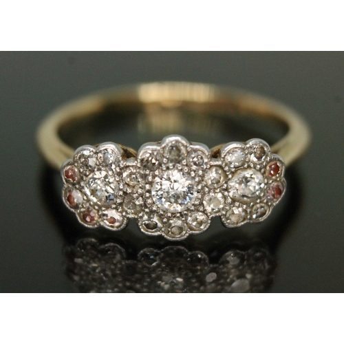 143 - An early 20th century diamond cluster ring, formed from three transitional round cut diamonds twenty... 