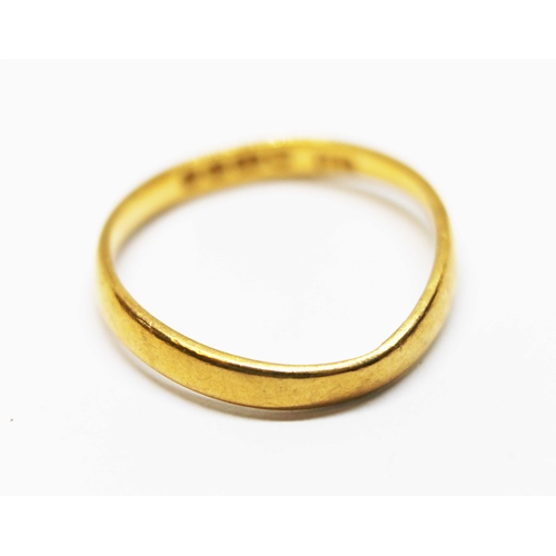 157 - A hallmarked 22ct gold wedding band, wt. 2.2g, size M.