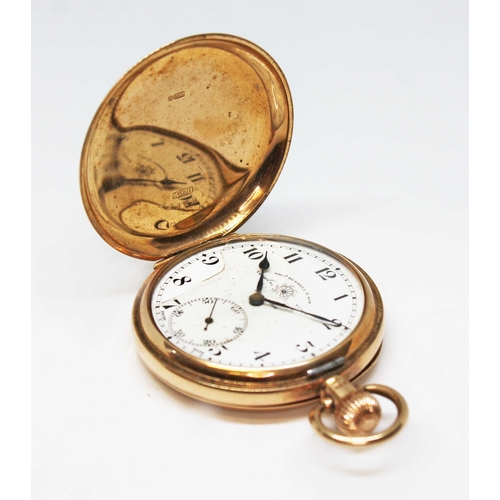 97 - A Thomas Russell & Son 9ct gold full hunter pocket watch, signed white enamel dial with Arabic numer... 