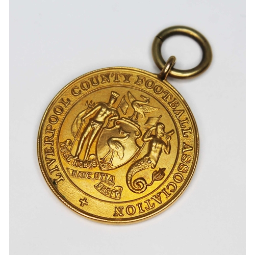 217 - A Liverpool County Football Association Junior Cup winners 1938-39 hallmarked 9ct gold medal, wt. 5.... 