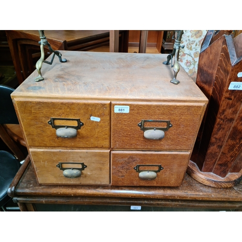 881 - A set of four vintage oak filing drawers.