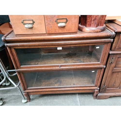 883 - A Globe Wernicke oak sectional bookcase.