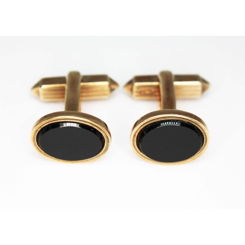 206 - A pair of 9ct gold and black onyx cufflinks, gross wt. 9.6g.