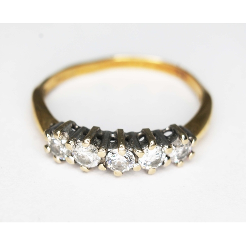 212 - A five stone diamond ring, 18ct gold import marks, gross wt. 2g, size K (band bent).