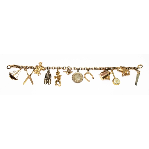 220 - A charm bracelet comprising two hallmarked 9ct gold charms, five marked '9ct' and four unmarked, cha... 