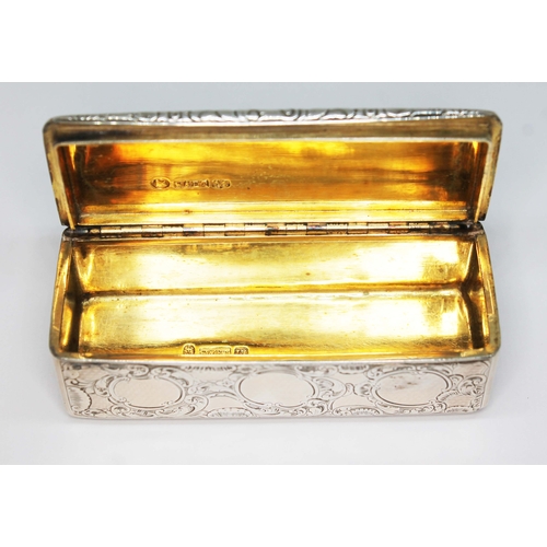 226 - An early Victorian silver snuff box of rectangular form, bright cut engraved with scrolls, the hinge... 