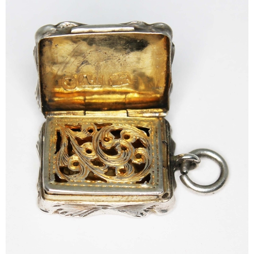 228 - A Victorian miniature silver vinaigrette, Alfred Taylor, Birmingham 1855, length 25mm.