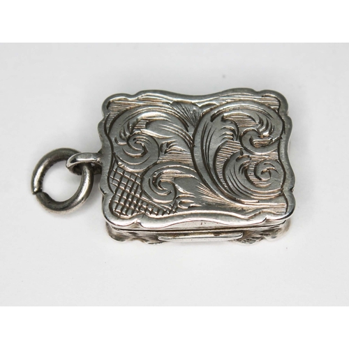 228 - A Victorian miniature silver vinaigrette, Alfred Taylor, Birmingham 1855, length 25mm.