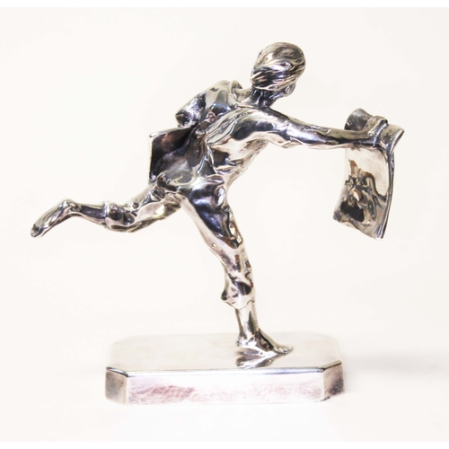 229 - An Elkington & Co silver and silver plated figure depicting a news paper boy, height 15cm.