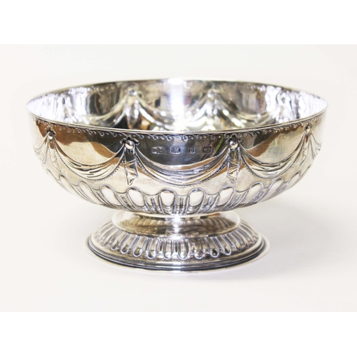 232 - A Victorian silver punch bowl, embossed with swags and bows, gadrooned, pedestal foot, inscribed 'Jo... 