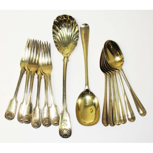 236 - Assorted silver gilt cutlery comprising a set of six forks and a large  spoon with shell bowl by Wil... 