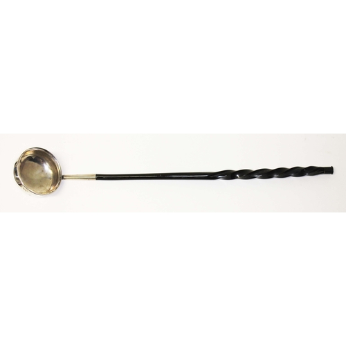 241 - A Georgian punch ladle with twist baleen handle, indistinctly marked length 40.5cm.