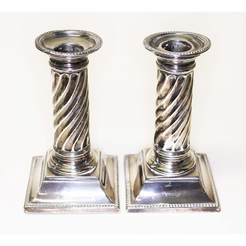 242 - A pair of Victorian twist silver candlesticks, London 1889, height 13.5cm.