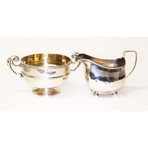 245 - Hallmarked silver comprising a cream jug and a twin handle bowl, gross wt. 8ozt.