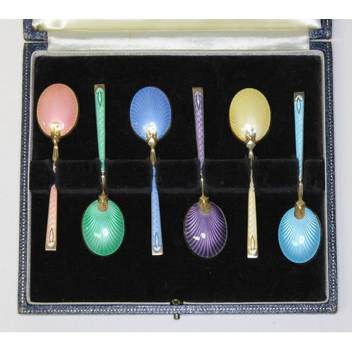 252 - A cased set of six silver gilt and enamel tea spoons, Turner & Simpson, Birmingham 1966, length 8.5c... 