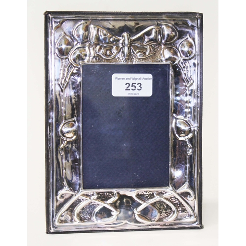 253 - An Art Nouveau style silver photograph frame, sponsor's mark 'CSRLtd', London 1978, 15cm x 20.5cm.