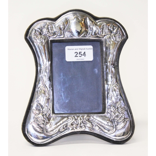 254 - An Art Nouveau silver photograph frame, Sponsor's mark 'KFLd', London 1984, 15.5cm x 18cm.