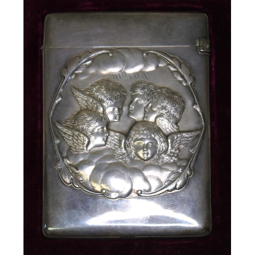 255 - A late Victorian silver card case embossed with cherubs, William Comyns & Sons, London 1897, 7cm x 1... 