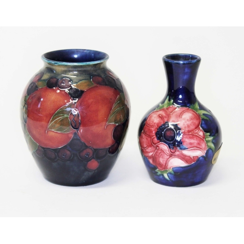 263 - Two Moorcroft pottery vases, heights 9 & 9.5cm.