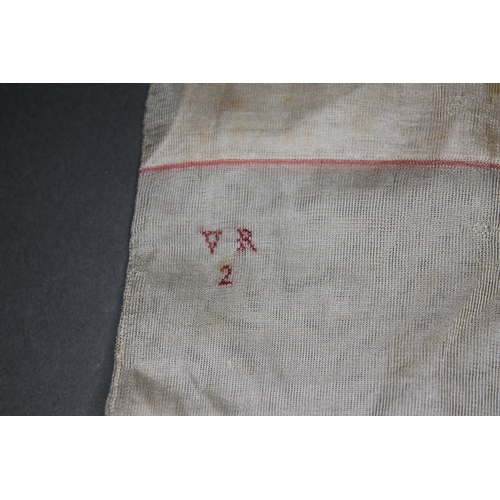 273 - A pair of Silk stockings reputedly once belonging to Queen Victoria, monogrammed 'VR2' above a numbe... 