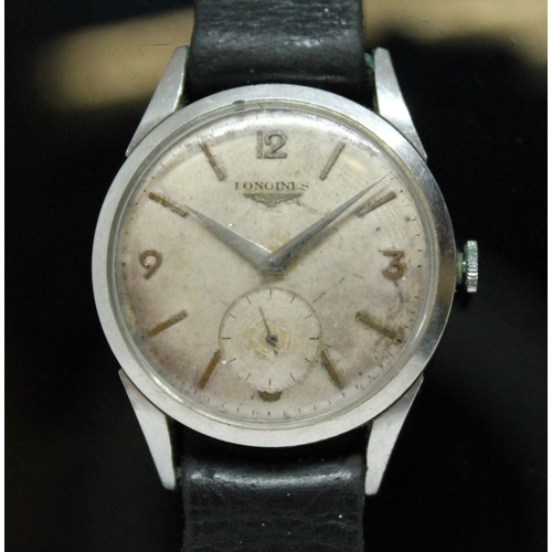 83 - A 1956 Longines stainless steel wristwatch, ref. 6666-4, cal. 12.68Z, silvered dial with outer minut... 