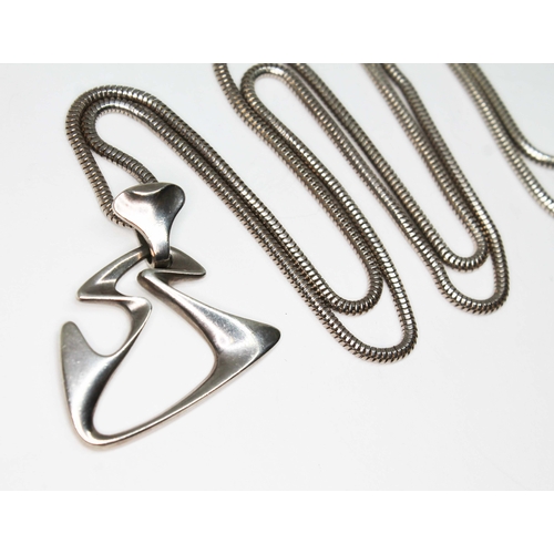 79A - A Danish Modernist silver pendant no. 125 designed by Henning Koppel for George Jensen circa 1955, L... 