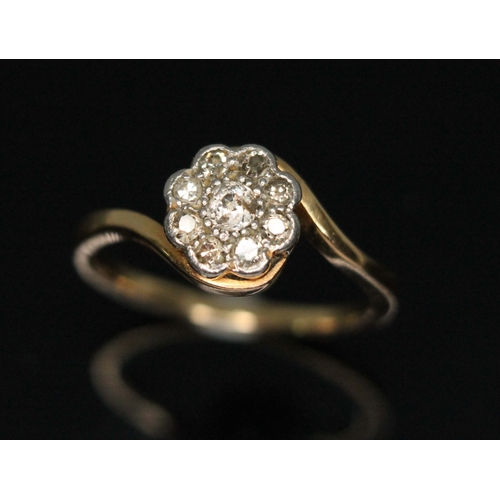 79C - An early 20th century diamond cluster ring, the head measuring approx. 8.04mm in diameter, yellow me... 