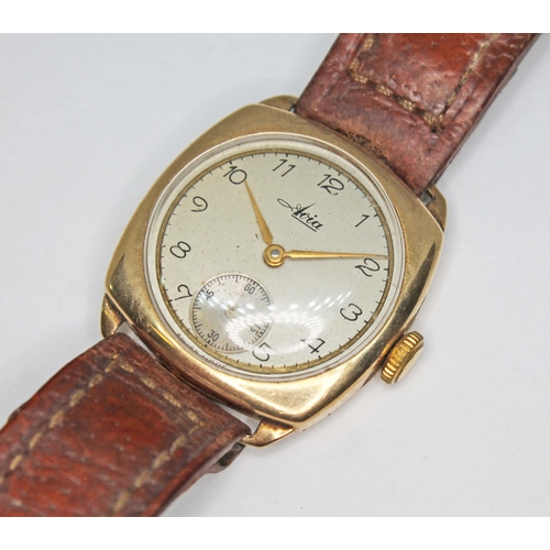 79G - An Avia 9ct gold wristwatch, signed champagne dial with Arabic numerals and seconds subsidiary, 15 j... 