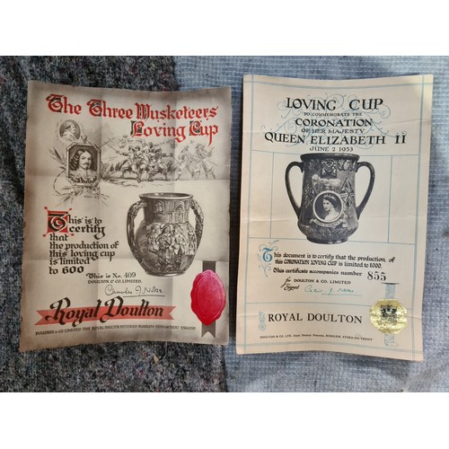 280 - Two Royal Doulton loving cups with original certificates, The Three Musketeers by Charles Noke (dama... 