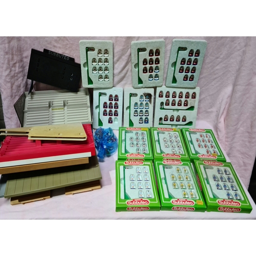 28 - A box containing Subbuteo teams and stands.