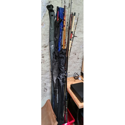 229 - A collection of mainly sea fishing rods