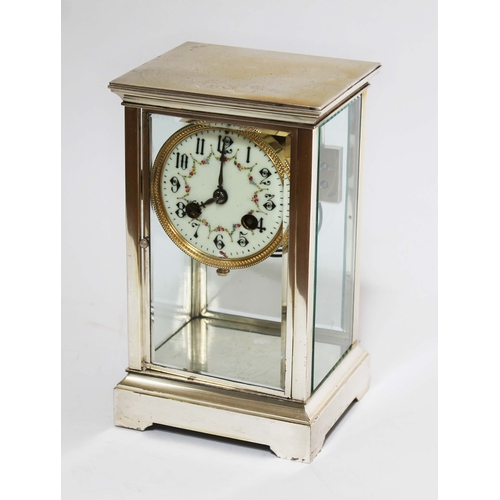 118 - A four glass mantle clock with enamel dial, height 23cm.