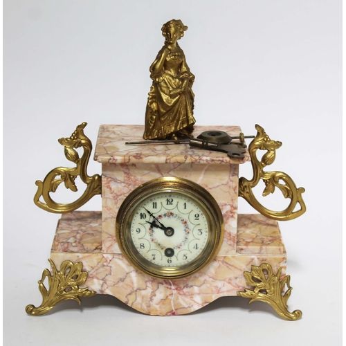 120 - A French gilt metal mounted marble mantle clock with enamel dial, length 27cm.