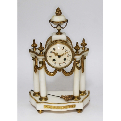 124 - A French white marble four pillar Portico clock, height 39cm.