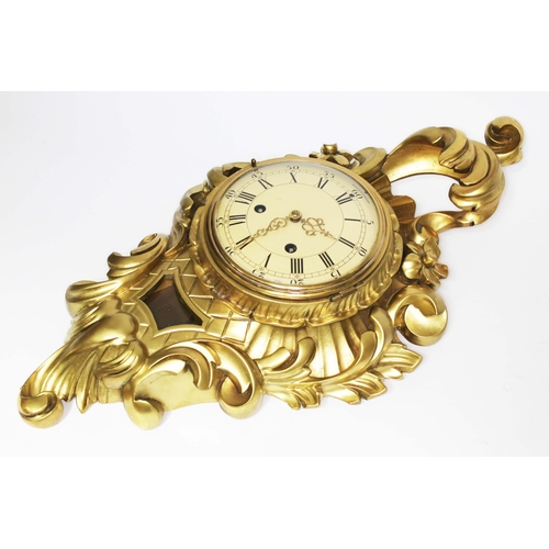 127 - A Westerstrand cartel clock, length 56cm.