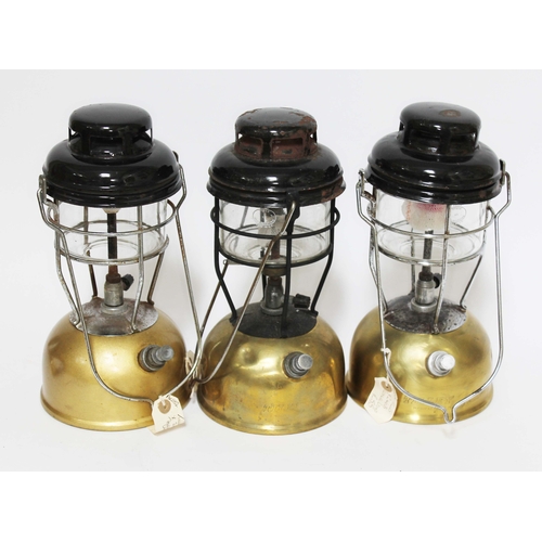 146 - A group of three Tilley lamps.