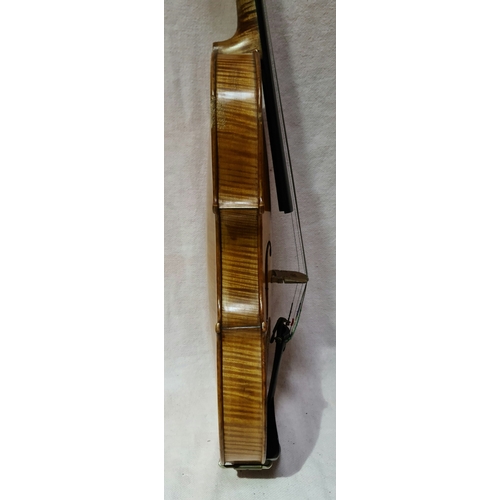 236 - A late 19th century violin, one back, length 356mm, bearing label 'Joseph Guarnerius 17', with three... 