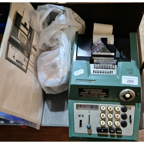 286 - A vintage Olivetti Summa Prima 71/20 adding machine with rolls and instructions manual.