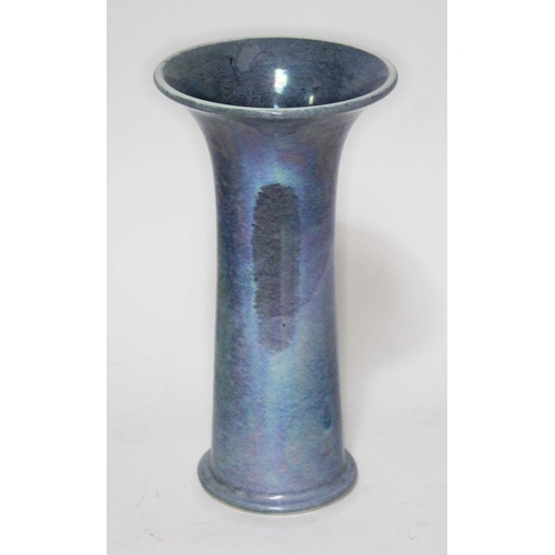 291 - A Ruskin pottery vase, blue lustre, flared rim, impressed marks to base, height 29cm.