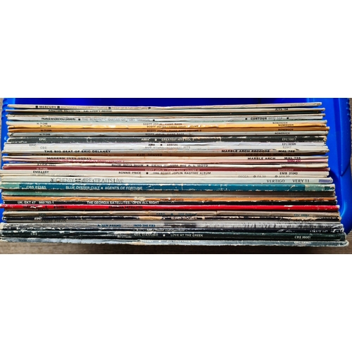 71 - A box of LPs to include Dire Straits, Blue Oyster Cult, Georgia Satellites, Focus, FMX, Brian Adams,... 