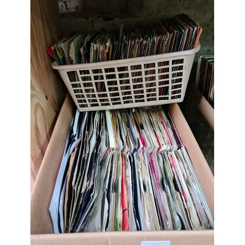 78 - Two boxes of 45s.
