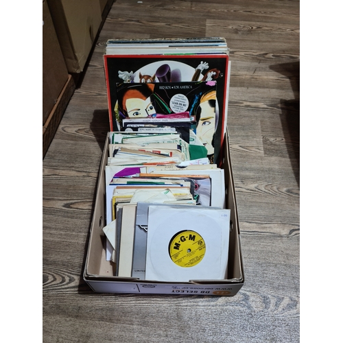82 - A box of LPs and 45s.