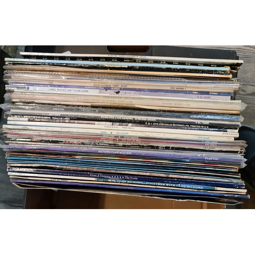 91 - A box of records, 1970s and 80s including Meat Loaf, Fleetwood Mac, Cliff Richard etc.