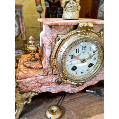 119 - A French marble and gilt metal mounted mantle clock with enamel dial, length 32cm.