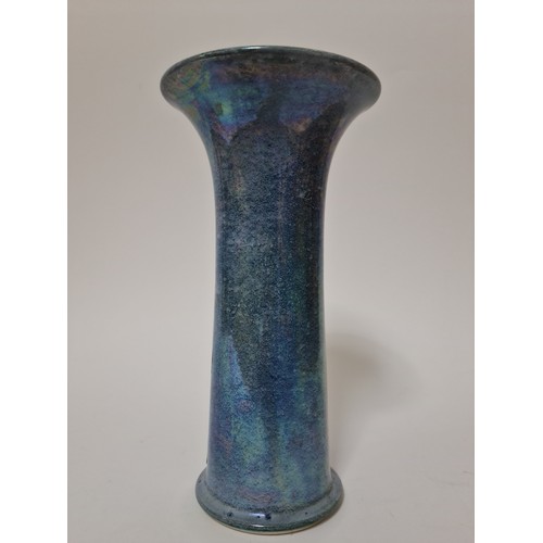 291 - A Ruskin pottery vase, blue lustre, flared rim, impressed marks to base, height 29cm.