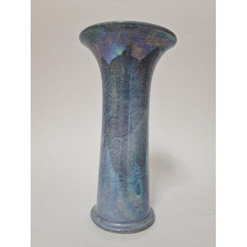 291 - A Ruskin pottery vase, blue lustre, flared rim, impressed marks to base, height 29cm.