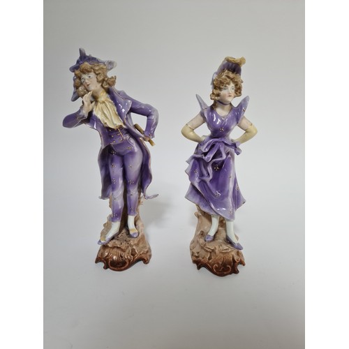 354 - A group of 14 porcelain figures comprising 12 bisque and another pair glazed, tallest 51cm.