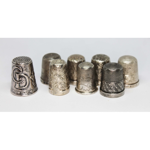 67 - Eight thimbles comprising four hallmarked silver, three marked 'Sterling Silver' and another unmarke... 