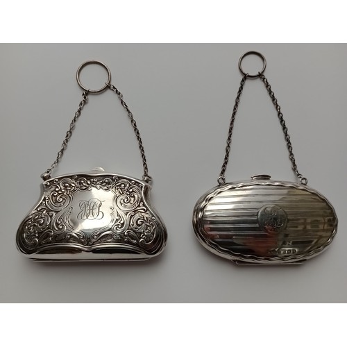 174 - A pair of hallmarked silver purses.